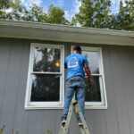 Sweet Home Makeovers installer working on residential windows